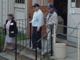 photograph of group exiting the armory 